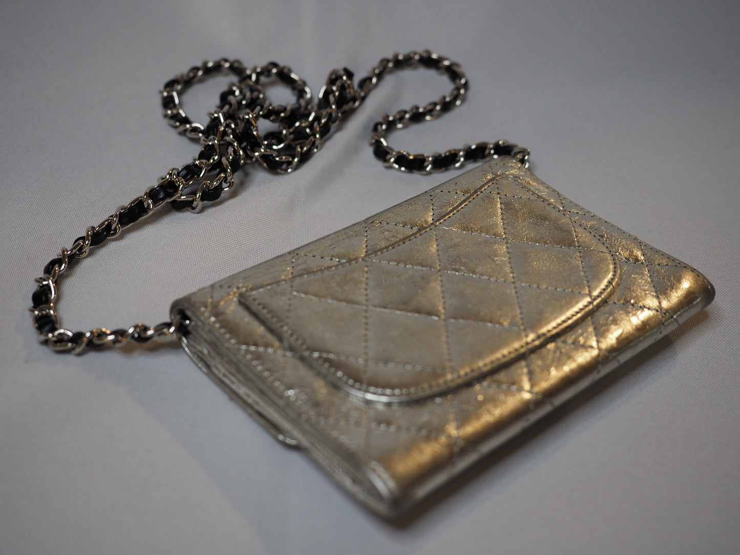 Chanel metallic Reissue-style wallet With aftermarket chain
